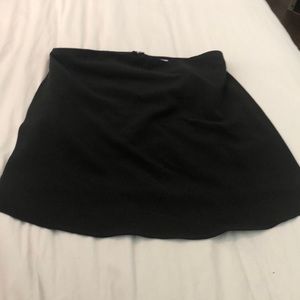 Tobi size small, open slit strapless black top